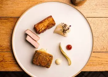 Orchard farm pork loin, crispy cheek croquette, turnips, crab apple, pork belly, Aspalls cider, mustard frills