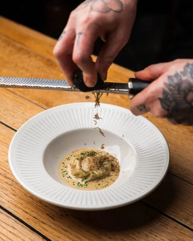 Wild mushroom & egg yolk raviolo, cep vinaigrette, wilted spinach, mushroom sauce, truffle Wild mushroom & egg yolk raviolo, cep vinaigrette, wilted spinach, mushroom sauce, truffle