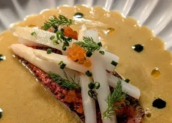 Saffron cured red mullet, spiced fish soup, white asparagus, homemade sriracha